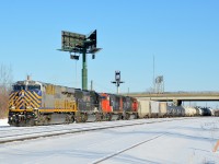<b>Switching with a CREX leader. </b> CN 527 is switching at the western end of Southwark Yard in St-Lambert with CREX 1205, NS 2549, CN 5875 & CN 5632. The Citirail and NS unit had entered Montreal on CN 529, an NS run-through train.