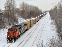 <b>A solo cowl unit.</b> CN 527 with CN 5518 solo is about to enter Taschereau Yard.