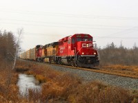 Having cleared from Wolverton and by the rail crew in the Puslinch siding, CP 2250 along with BNSF 4585 and CP 3120, cruises up to Concession 7 on a cold, snowy, overcast afternoon.