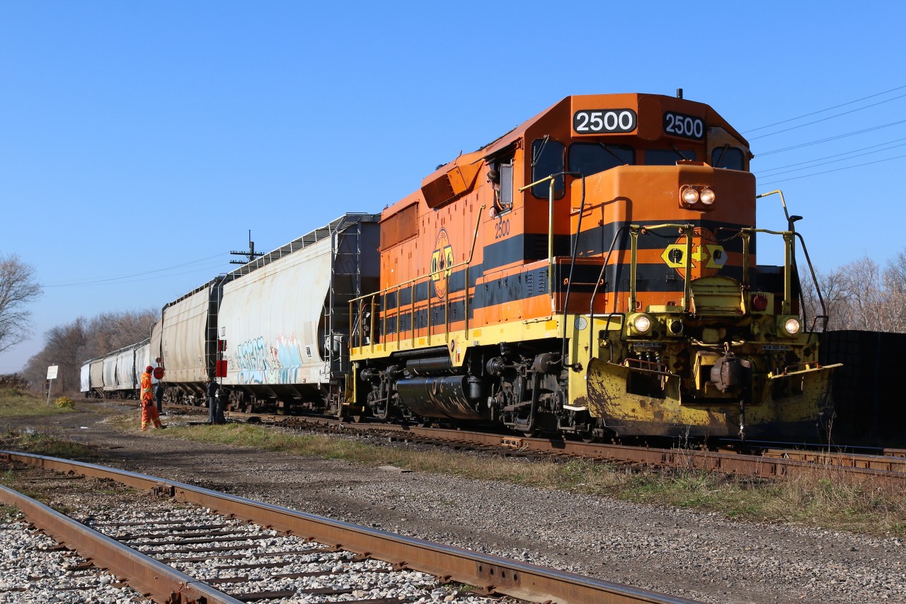GEXR local 582 with Quebec Gatineau GP35 #2500 backs into the siding at the lessor know Guelph Junction in Guelph. The train arrived twenty minutes earlier after switching a lumber yard on the Fergus spur and is now preparing to pull this cut of covered hoppers into Guelph yard for local 580 which will arrive in about an half hour. It's alway nice seeing an old GP35 in action especially one that is still turbo charged considering the number of GP35s out there basically de-turboed into GP38s.