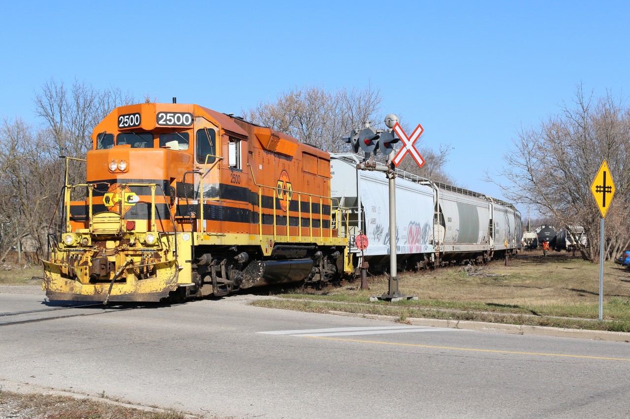 With it's work completed in Cambridge, borrowed QGRY GP35 #2500 is busy working the unusually full Guelph yard before returning to Kitchener.