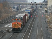 The new track 3 was in service but allot of work was going on well after...here a WB CN with BNSF 5140 and KCS 4020 dims the headlight for an opposing train