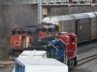 CN 435 doubles out his left at Aldershot while eastbound CP 255 with 2 leasers trailing heads east over the CN