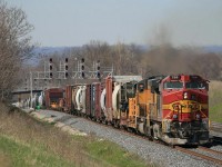 "BNSF 788 East calling foreman...." the great thing about living beside the tracks when a work program is going on....you dont miss anything interesting...grab the camera...walk up the berm...click...walk back home to work...Here an EB BNSF-UP combo head down track 3 with a mixed freight