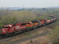 The Steel train negotiates down the Hamilton Sub with SOO 6051- BNSF 8057 (paying back HP hours ) - CP 6016. This combo ping ponged back and forth on this train for some time.