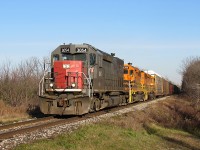 GEXR 431 rolls past Breslau, Ontario, prepared to head into Kitchener Yard. Even though they're not seen in the picture, for those who don't know yet, the Guelph Sub now has working CTC signals installed and functioning. It's almost werid seeing the signals flashing and doing their thing, considering I haven't seen signals on the line before. The usual trio of EMD power is on the head end. 