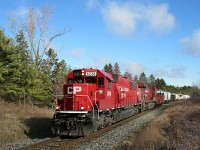 After hearing CP 6238 north on the Hamilton Sub, I knew it was 255. So I prepared for the shot at the Killean mile board at MP 54 Galt Sub. The sun came out just in time too. 