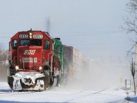 By 2008, most CP southbounds for the Hamilton Sub were being routed via Guelph Jct with only the eastbounds (northbounds) designated for the CN Oakville Sub...however the day after a snowstorm, a very late 254 heads west across the Oakville Sub past Aldershot cold storage kicking up the snow; presumably the Hamilton Sub south of Guelph Jct was snowed in. 