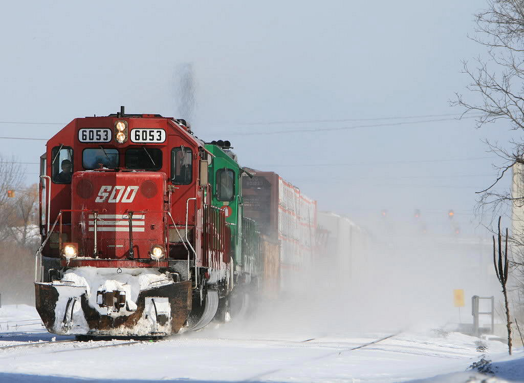By 2008, most CP southbounds for the Hamilton Sub were being routed via Guelph Jct with only the eastbounds (northbounds) designated for the CN Oakville Sub...however the day after a snowstorm, a very late 254 heads west across the Oakville Sub past Aldershot cold storage kicking up the snow; presumably the Hamilton Sub south of Guelph Jct was snowed in.