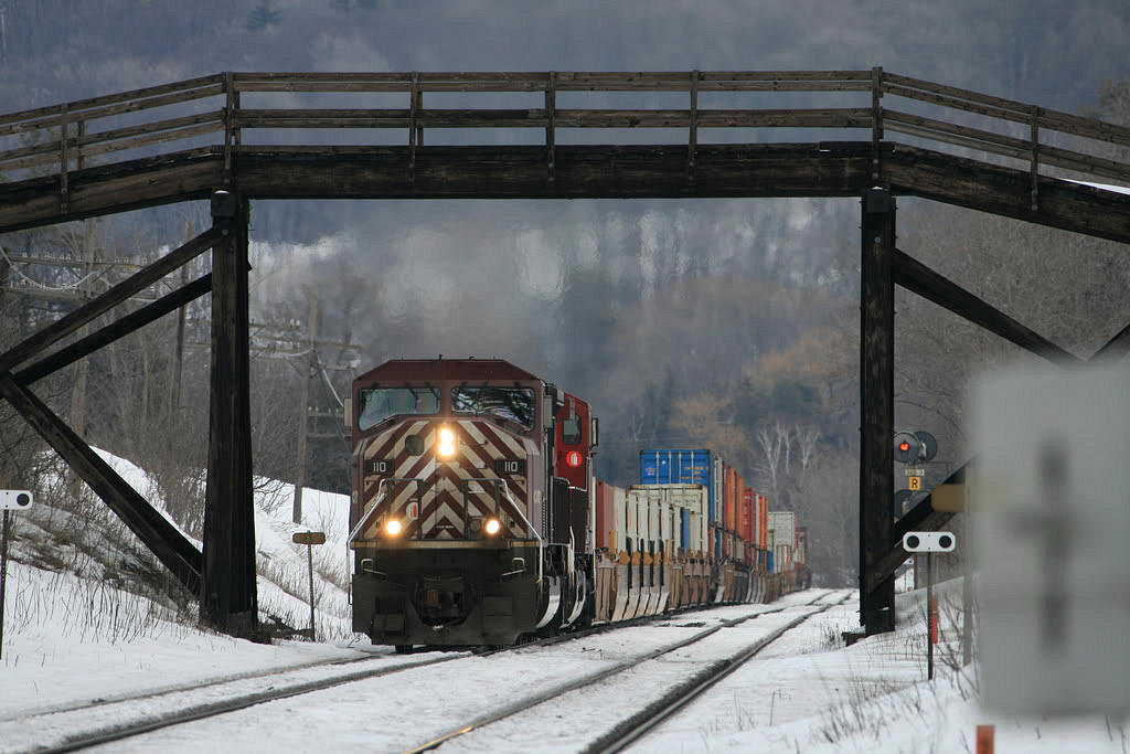 CP 159 westbound at a favorite spot...with a CEFX maroon SD90 leading