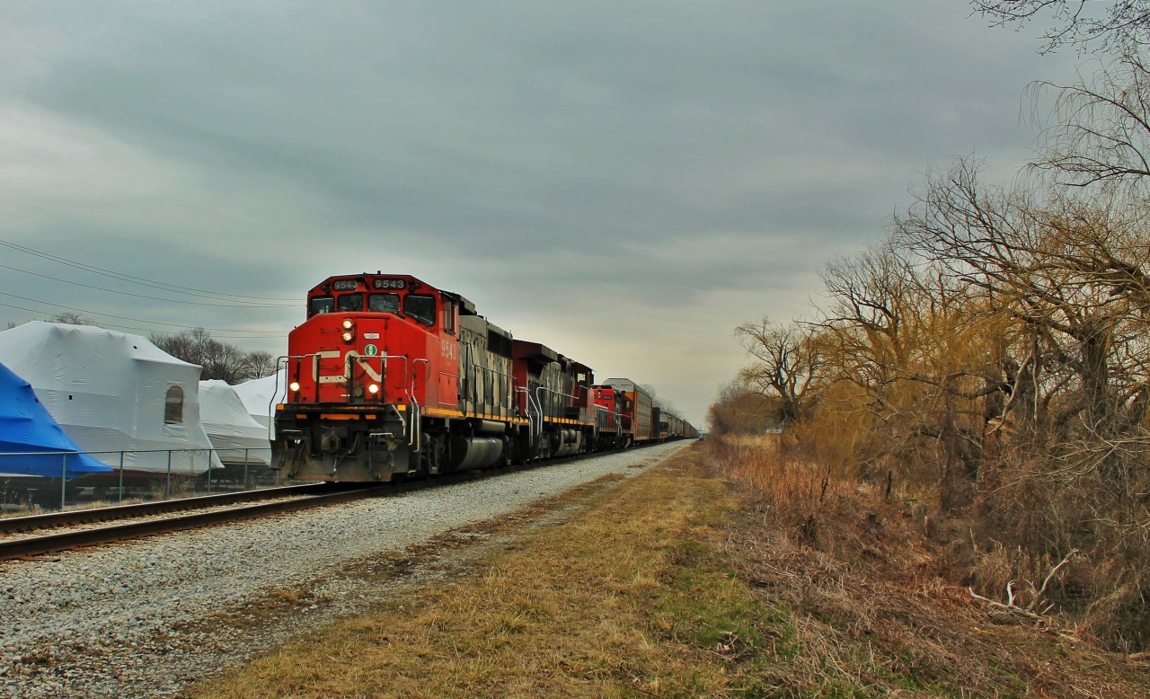 The local boaters still haven't been out to unwrap their boats yet on this grey April afternoon. My friend and I ended up chasing this into Windsor as there weren't any CP's coming. Now this train comes into Windsor at 3 or 4 in the morning. For any of the locals on here this is right next to Sandbar Restaurant in Puce. The Puce River is about 1/4KM from this spot.