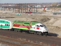 GO transits Christmas 2015 locomotive 665, or Santa,s other ride. Seen here passing what will be Go transits eastern maintenance facility. 