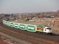 Santa,s other ride. go 665 decorated for Christmas 2015. wb passing the new, one day GO maintenance terminal in whitby. 