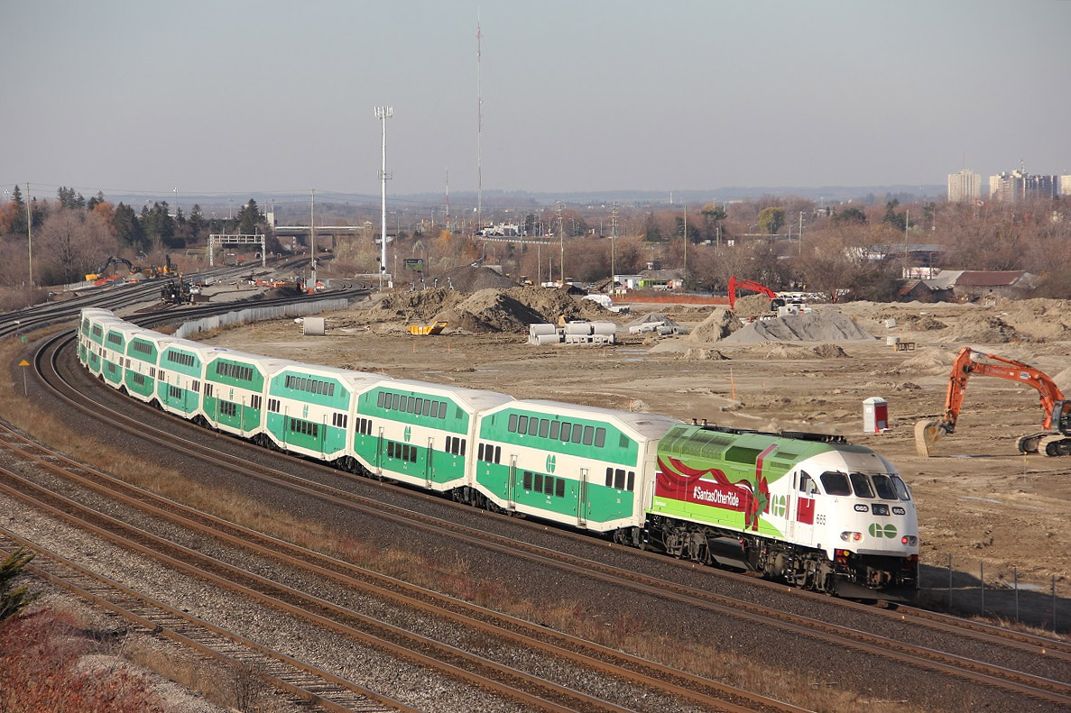Santa,s other ride. go 665 decorated for Christmas 2015. wb passing the new, one day GO maintenance terminal in whitby.