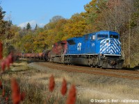 Photographed from Kay Drage park in Hamilton, CEFX 118 leads train 246, Sudbury to Buffalo, NY. For some reason 246 was stuck on the hill downgrade at Hamilton and I managed to catch up to it on the way to a family gathering, I certainly had no plans to get this, but when opportunity knocks..<br><br>With 246 pinging and ponging back and forth, 118 has been in captive service - this unit is apparently leased to NS now. 118 led 247 north today and should return on Wednesday morning if all goes to plan. Shoot it while you can! Since this is a SD90 formerly used in  CP service (remember when they were red? <a href=http://www.railpictures.ca/?attachment_id=8015 target=_blank>(See this Aivo Meriments rp.ca photo of CEFX 119)</a>) these qualify to lead in Canada, as opposed to most foreign units.
