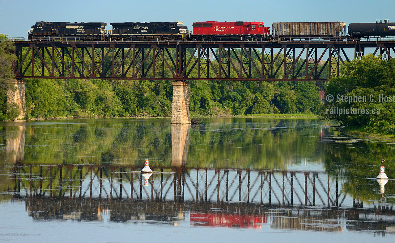 Photo: A fairly common scene is NS and CP power on Train 641.. ethanol via Buffalo and Windsor - but a pairing of power now being considered in the boardrooms of two Class 1's..
Canadian Pacific has offered to purchase the Norfolk Southern Railway and railfan speculation aside, the deal is now in the hands of Norfolk Southern and Canadian Pacific management. From news reports, CP made the offer on November 9 but NS asked the letter be kept private until the CEO Wick Moorman and Hunter Harrison meet in person, which happened on November 13. News of the offer was leaked to the media and made official on November 17.CP's current offer is non binding, and highly conditional: a 50% offer of CPR stock and 50% cash based on closing on November 13 and it is highly speculated that the offer will be officially rejected by NS , leading to CP to consider making the offer sweeter for NS shareholders. That's all the news there is at this point, so let's go to the railfan side of thingsSo for railfans What may come about this change? Will any lines near you see increased traffic? or any redundant routes that you see which may be consideration for rationalization? Feel free to add your thoughts below. Please do not comment on the status of steam, heritage locomotives or your special paint schemes. We have no idea what may happen there - heck CP and NS could create an entirely new identity or assume one of the two current (CP or NS) identities.  Leave that discussion for IF and after the deal goes through (and lets not forget the STB approval!)