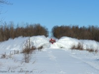 <b>As Dave Brook said.. it's coming!</b> winter will soon be here and we'll have to see how heavy it'll be to witness scenes like this in 2016. I find this image interesting as the plume is 200 feet wide indicating unusually light snow. The plow extra is approaching the DeBruyen family farm in Salford headed to Tillsonburg. Photo taken with a telephoto lens, which is the tool of choice for plow shooting. Stand way back if you have a wide angle, it's dangerous to be too close.

<br><br> And a bit of shameless self promotion - I was lucky enough to have an article in the current (December 2015) <b>TRAINS magazine</b> on plowing in Ontario, if you haven't had a look please do, no spoilers, but it's a different angle on the subject and contains photos that have not been previously published anywhere. 

