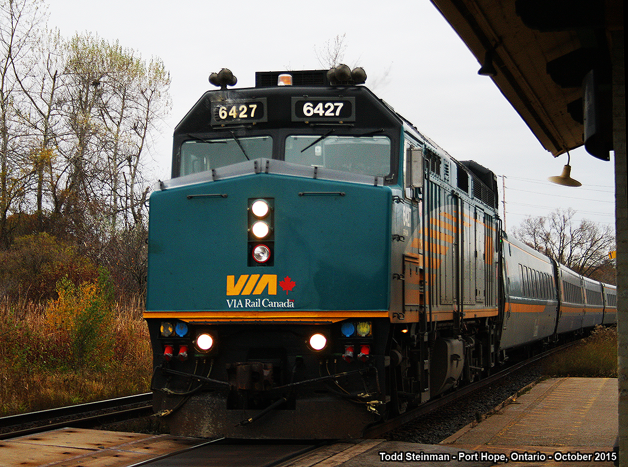 TRICK OR TREAT!  Saturday marked the day of Halloween, and I was able to make my way east to visit a friend in Cobourg. Having arrived fairly early, I made my usual stop at the station in Port Hope. No longer than 5 minutes after my arrival, a horn marked the arrival of train 61 led by VIA 6427. I ran to the platform in front of the station to see it fly by on it's way to it's next station stop of Oshawa. Sadly after this train, I missed a westbound CN freight and the eastbound "J" train that was going to Brockville - where it would sever...one train to Ottawa, the other to Montreal. However, this was certainly a treat, to say the least - that started my day of unusual activity of photographing in this area.