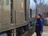 <b> HEY THERE, HOW ARE YA? </b> Not sure what the conversation was between these two VIA employees, but they take the time to chat during a stop at the Brantford station.