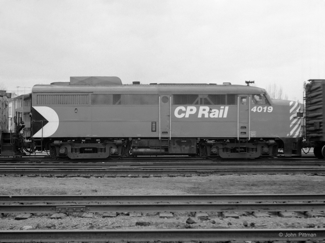 Recently re-painted, FA-1 CP 4019 is the third unit on CP's afternoon freight from Trois-Rivieres back to Montreal. This FA-1 was built by MLW in 1950 and has CP class code DFA-15b. I expect this is the third paint scheme CP 4019 has worn - CP block letter, CP script, multimark. 
The unit in front looks like an RS-3 from a US railroad, I recall seeing Boston & Maine occasionally. 
I'm glad I kept most of the negatives from my early years of railway photography, but wish I'd taken more.