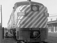 FA-2 CP 4082 in fresh multimark paint leads two FB-2's, by 1970 a freight ABB set was rarely seen here. <br>
It is about to reverse and couple on to the afternoon train for Montreal that had been assembled by the Trois-Rivieres yard switchers. <br><br>
On the station platform a LUNCH sign can be seen, relic of an era before Quebec's language law.

