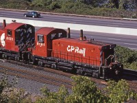 Northbound CP 8161 and 8131 are stopped with their train approaching Desjardins on the CP Hamilton sub, awaiting a signal to proceed. 