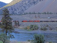Grain loads meet coal empties (that also had 2 mid train SD40-2's) late in the afternoon north of Lytton