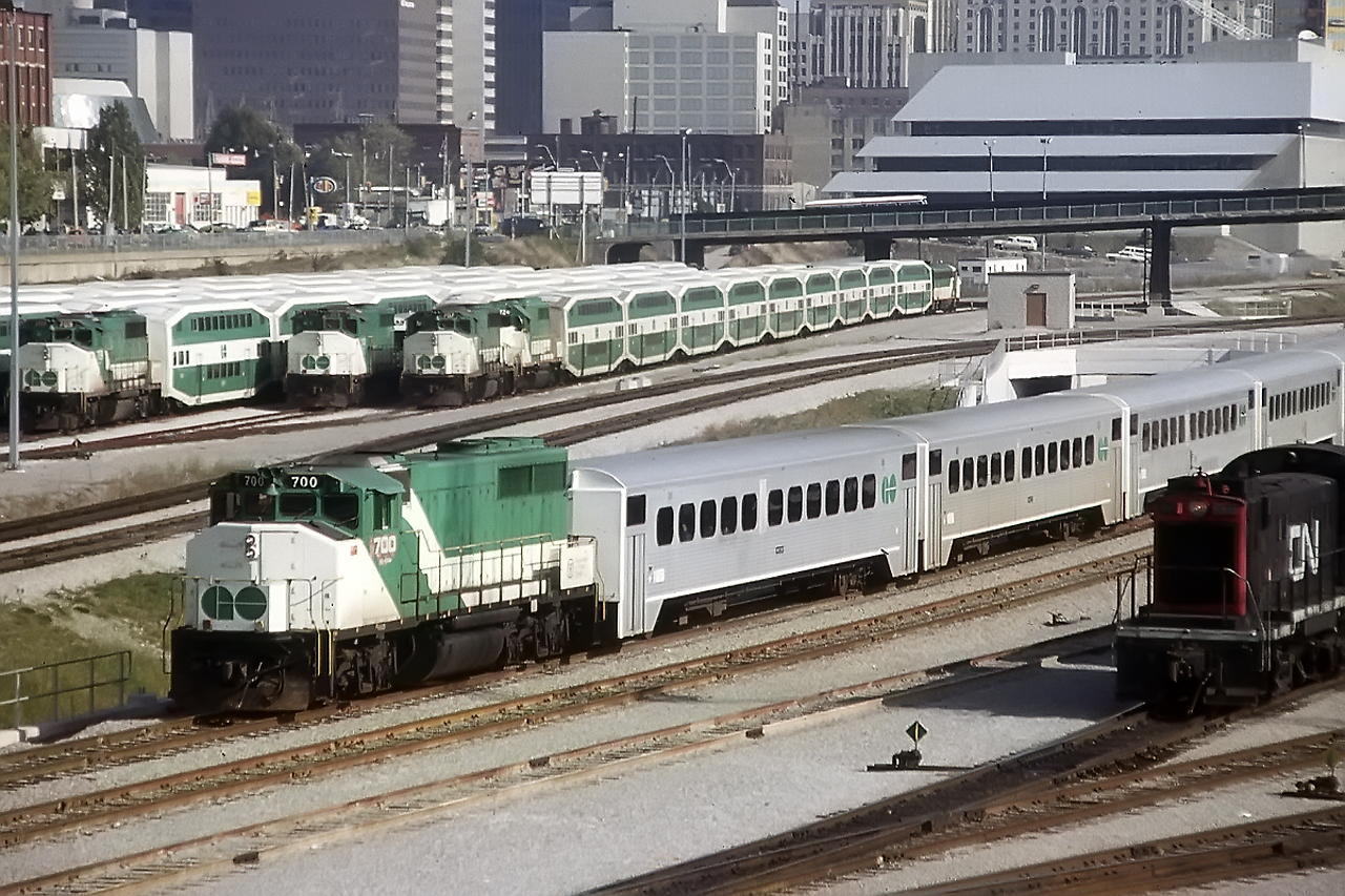 The GO Fleet at rest at Bathurst St.The GP40-2's went to CN, and I have no idea what happened to the xex- Rock Island GP40's. Not the middle train in the yard that has one single level car behind the power. These were nice oddities