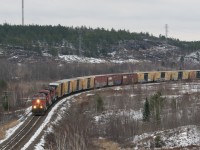 IC 2697, IC 2458 and CN 2130 haul their train northward on a mild November day. 