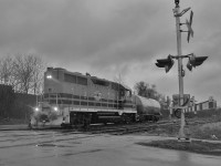 <b>Sometimes you just gotta go out in the rain...</b>  582 pulls tankcar UCLX 16118 from XW30 to drop it in XV yard for 580.<br><br>To see more photos, visit: <a href=https://www.flickr.com/photos/132395721@N08> https://www.flickr.com/photos/132395721@N08>