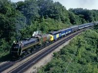 CN 6060 was regularly used on the Saturday VIA trains from Toronto to Niagara Falls in the late 70's, but on Thursday 7/24/1980 the Bullet Nosed Betty Mountain was used on a special for the NRHS convention that was centered in Toronto.  Here it's arriving Bayview Jct as seen off of Plains Rd.  