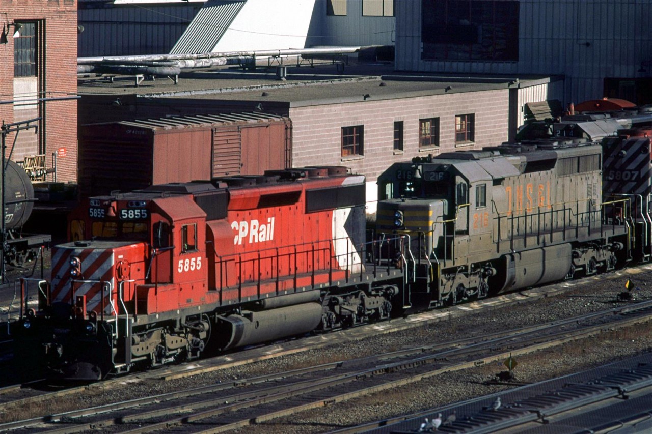 CP was leasing these SD-40's from QNS&L during the winter of '84-'85. I never saw them in a lead position, however.
Here, they have had some routine maintenance performed and are on the ready tracks.