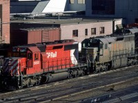 CP was leasing these SD-40's from QNS&L during the winter of '84-'85. I never saw them in a lead position, however.
Here, they have had some routine maintenance performed and are on the ready tracks.