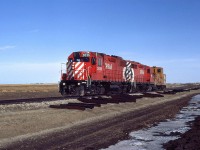 On our way to Miria's Pass for the first time, we passed this southbound local on the MacLeod Sub at Clarsholm. We photographed it here and then scooted ahead about 30 km and waited for the train to arrive. It did not arrive before we ran out of patience. There must have been work to be done at Granum. 