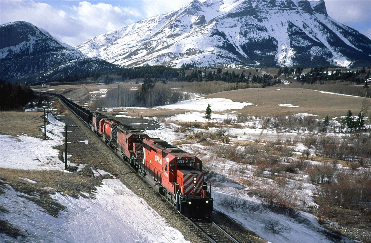 Another shot of an eastbound coal train in Crowsnest Pass. Mount Tecumseh is in the background.