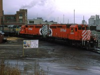 This power set is coming off the shops. The rain has stopped and the temperatures had plumeted, as is often the case in Calgary.
Note the QNS&L 216, trailing.