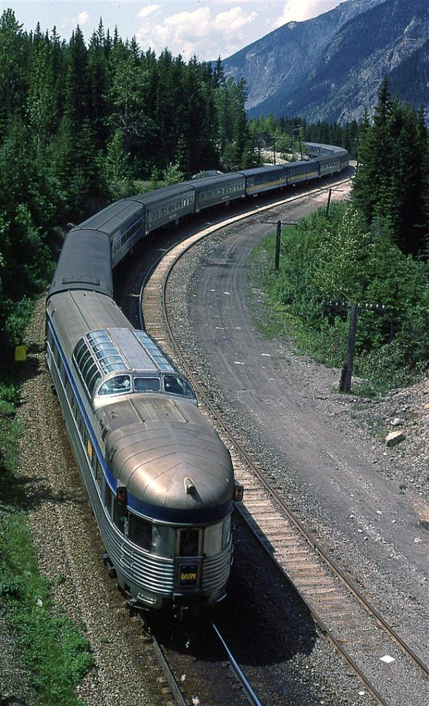 The rear end of the eastbound "Canadian" as it travels between spiral tunnels on Kicking Horse Pass.