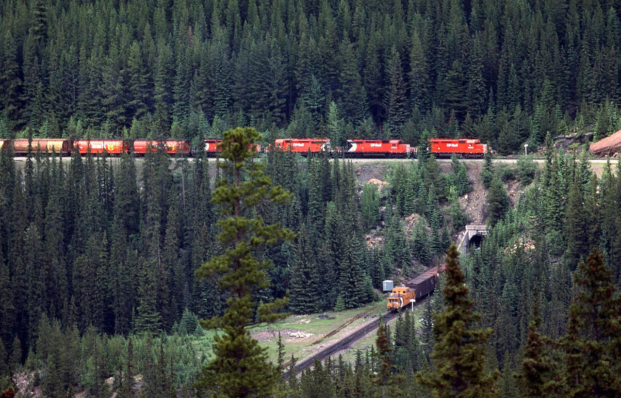 Even in 1985, the trees were beginning to obscure the view of the Lower Spiral Tunnel. This eastbound manifest is just long enough for the over-under shot.
