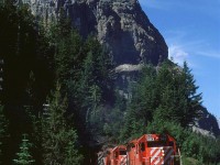 There are only a few days in the year when this shot is available with direct sun.
This eastbound train emerges from the tunnel at the west switch of Cathedral siding.