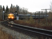The westbound "Canadian" splits the signals about halfway between Sunalta and Brickburn. I am sure there is a term for these signals, but I do not know it.
