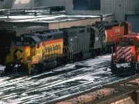 An interesting assortment of power at the shop in Calgary.
Chessie System (B&O) GP-40, Conrail GP-38, CP Sd-4- and a very clean CP GP-38