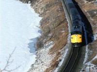 The eastbound "Canadian" skirts the Bearpaw reservoir on the Bow River - some of the best drinking water in the world came from here.
It is still a pretty small train for being so close to Christmas.