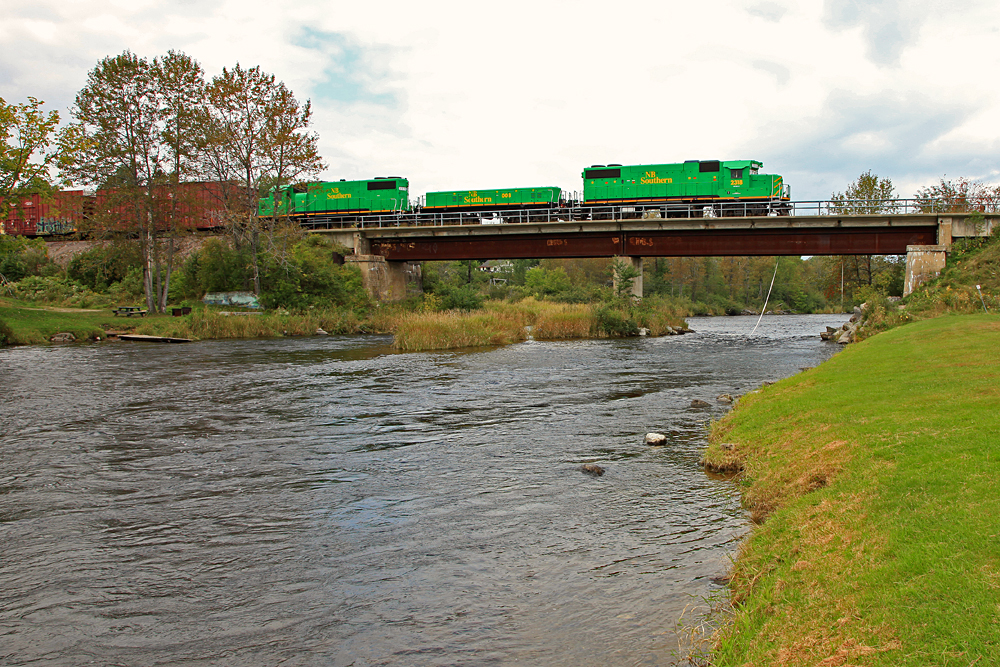 After working the yard in Vanceboro Maine, NBSR 908 crosses the St. Croix River from the US into Canada with work and a crew change just a few miles ahead at McAdam.