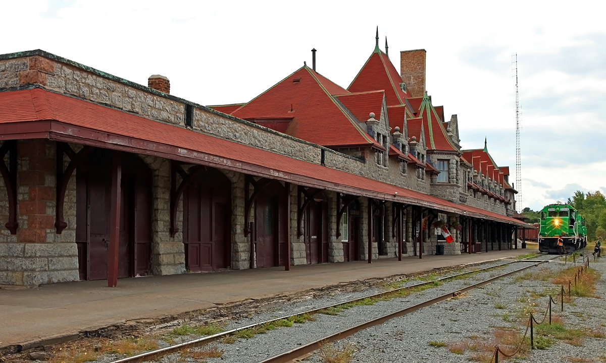 Having completed work in McAdam Yard NBSR 908 changes crews in front of the grand old CP station before continuing on to St. John Dever Street Yard.