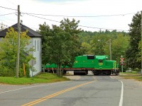 Engineer Gilles (two weeks shy of retirement) and conductor Chris bid us adieu crossing Harvey Road heading out of McAdam for St. John. We'd catch up with them again in a couple of days at Welsford right where they said they'd be, waiting to haul a load of government and railway dignitaries to view infrastructure upgrades so the suits could see an example of where their joint investment money was going.
