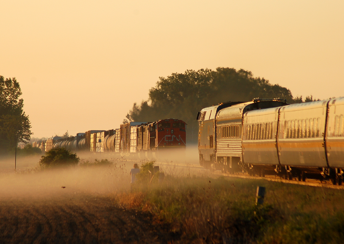 Meet at Blackwell
VIA 84 rolls East out of Sarnia just after 0600 and past a rather late running M38331 06 with CN 8808 - CN 2414 - CN 5509 and 125 cars