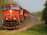 CN 527 slows down for a 10MPH slow half a mile up the tracks at Nampa, Alberta. Today this train wasn't too long, only 8500'.