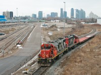 <b>Onwards back to Oakville. </b> A special move requested by GO Transit led to CN 556, the daily job out of Oakville to deliver 2 brand new Bombardier CEM cab cars to VIA's Toronto Maintenance Center. Seen here, 556 heads out from the west leg of the wye with two idler flat cars.
