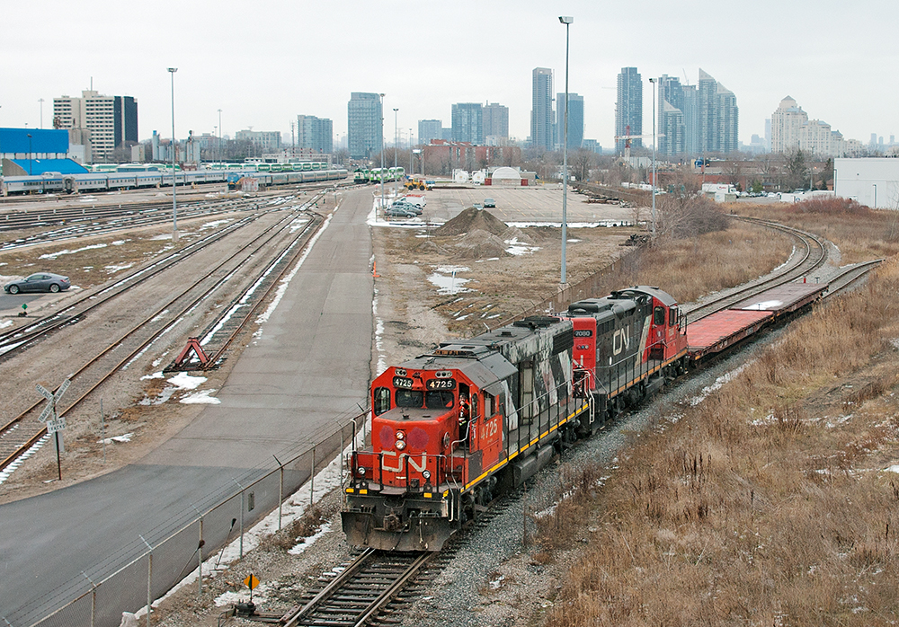 Onwards back to Oakville.  A special move requested by GO Transit led to CN 556, the daily job out of Oakville to deliver 2 brand new Bombardier CEM cab cars to VIA's Toronto Maintenance Center. Seen here, 556 heads out from the west leg of the wye with two idler flat cars.