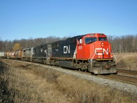 <b> I'll be home for Christmas.</b>  On a typical Southern Ontario Christmas Eve (sunny skies and no snow!), we see CN 435 rolling through Tansley.  Its 1352 and no doubt the London crew is eager to get home to their families.  Although not the newest or most powerful units on the railway, CN 5611, IC 6072 and GTW 5944 will have no trouble getting the train over the road.  The railway is entering the Christmas shutdown, away from home crews are heading home with trains operating early.  It will be a 'Silent Night' as CN shuts down almost all of their operations to allow their employees to spend Christmas with their families.  Come mid-afternoon on Christmas day, things will slowly ramp up with normal operations resuming on boxing day. 